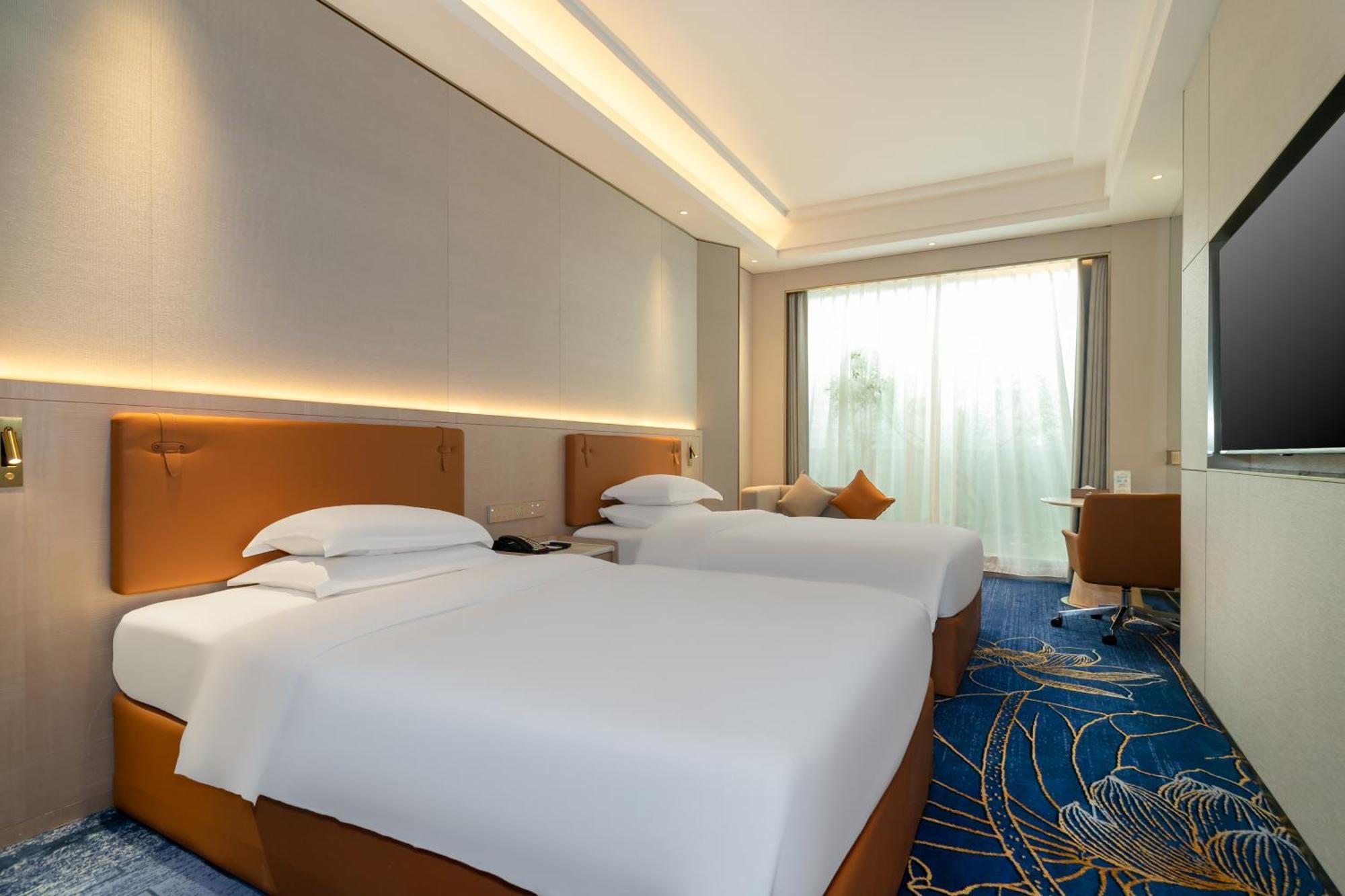Easeland Hotel Guangzhou Bagian luar foto